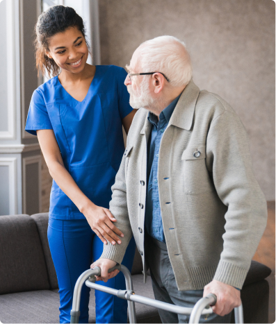 Female medical assistant caring for elderly man